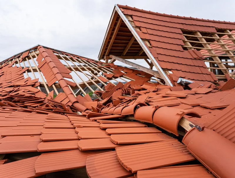 Storm-damaged tiled roof by GMG Roof Experts