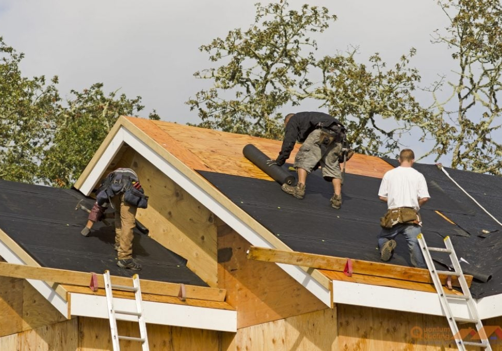 New roof deck and membrane going down by GMG Roof Experts