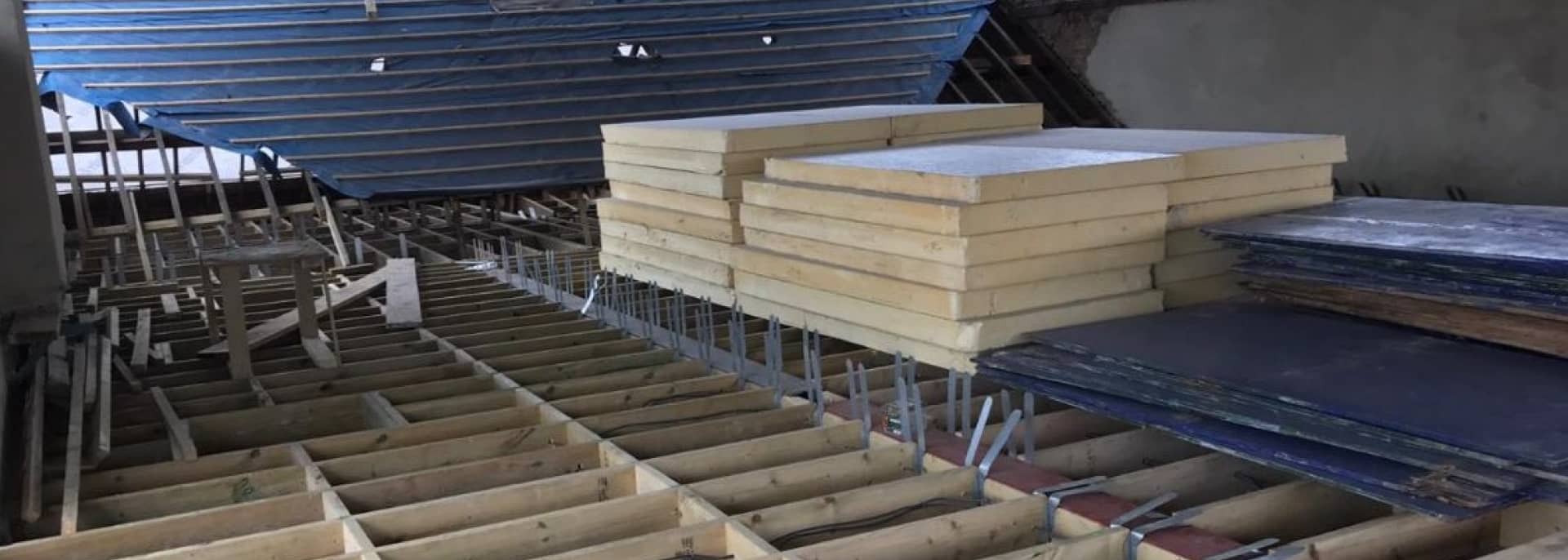 Natural slate stacked ready to lay by GMG Roof Experts in Hillingdon