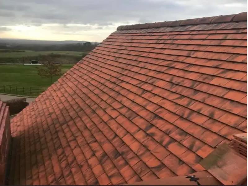A clean tiled roof after moss removal by GMG Roof Experts in the Hillingdon area