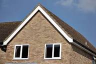 Barge board stop end and verge detail finished by GMG Roof Experts in Hillingdon