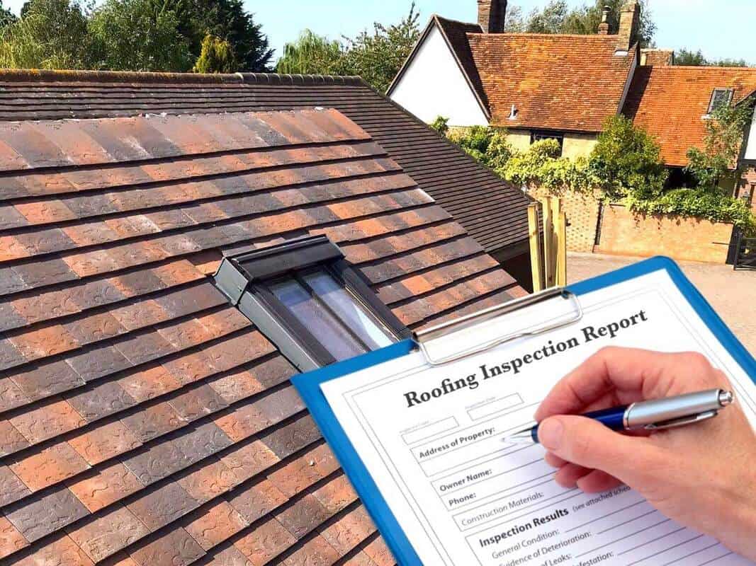 Roof inspection report being completed by GMG Roof Experts in Hillingdon