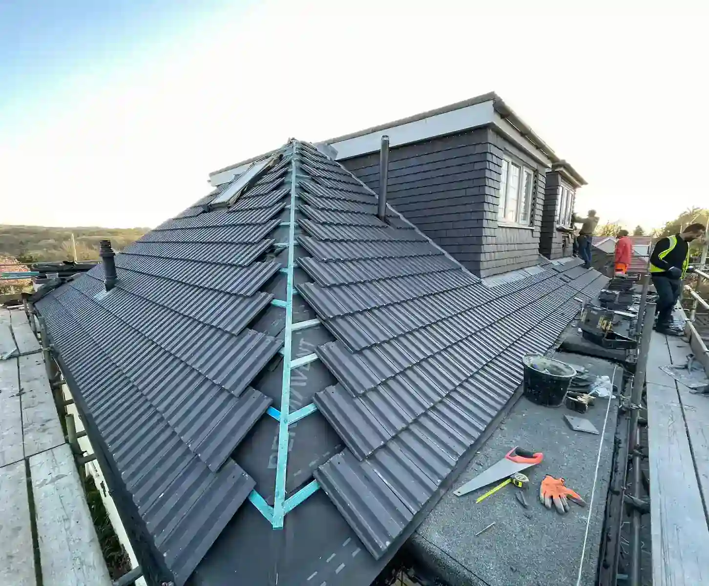 Roof re-covering in progress by GMG Roof Experts in the Hillingdon area