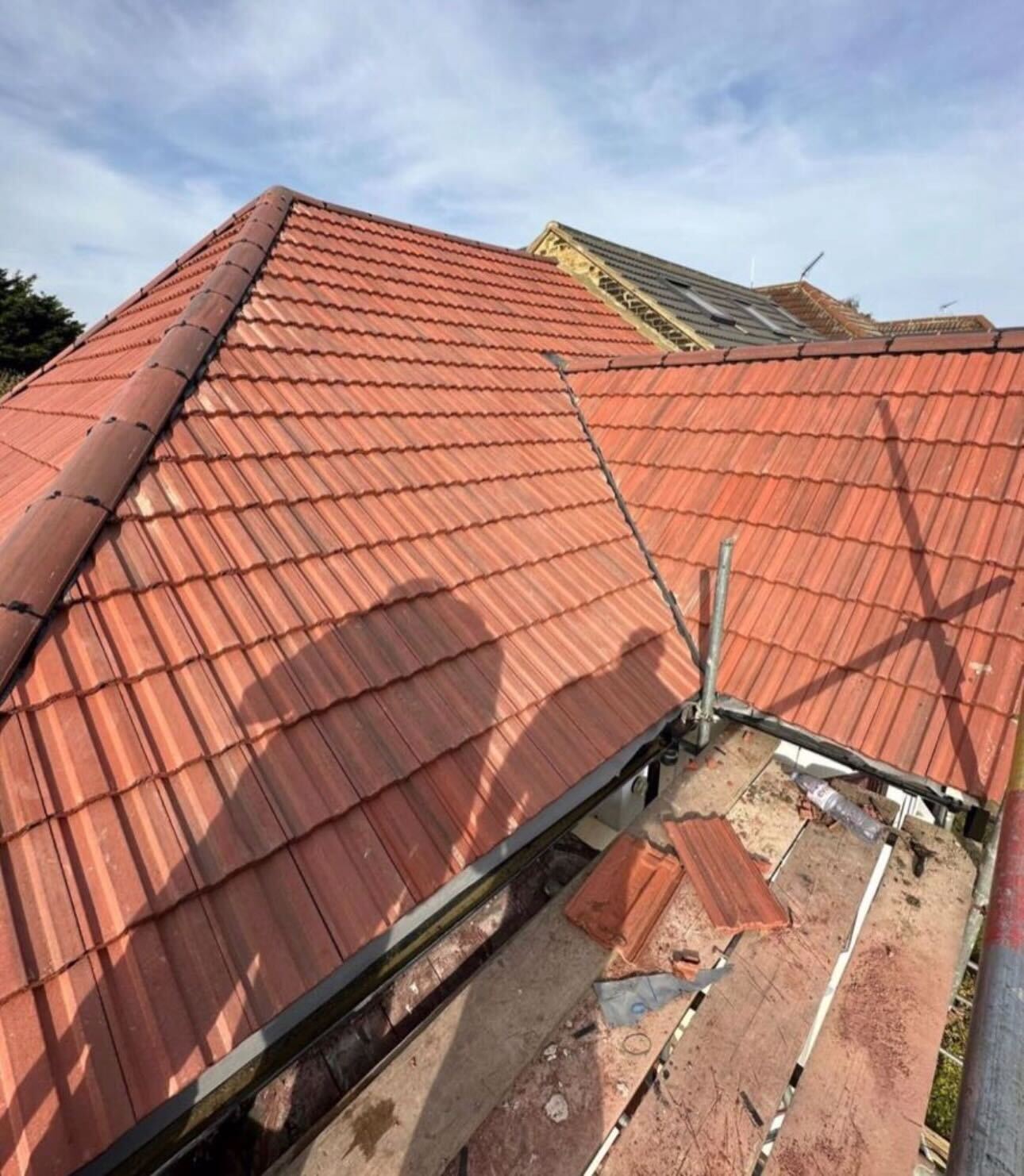 Tiled roof valley and leadwork completed by GMG Roof Experts in the Hillingdon area